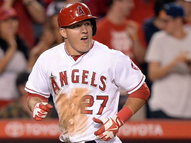 ANAHEIM, CA - MAY 21: Mike Trout #27 of the Los Angeles Angels reacts to his solo homerun for a 12-0 lead over the Seattle Mariners during the eighth inning at Angel Stadium of Anaheim on May 21, 2013 in Anaheim, California. The homerun gave Trout a single, double, triple and homerun, giving him the cycle for the game.