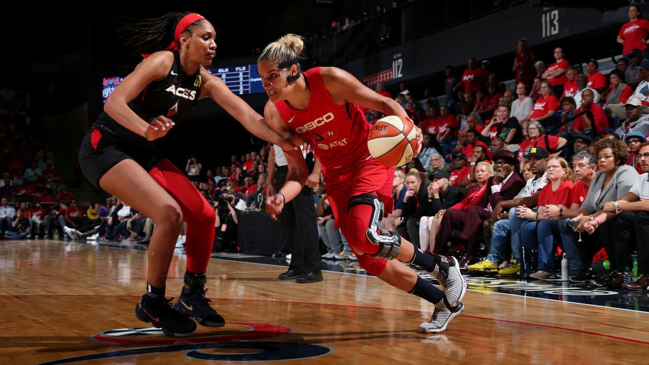 WASHINGTON, DC - SEPTEMBER 17: Elena Delle Donne #11 of the Washington Mystics handles the ball against A'ja Wilson #22 of the Las Vegas Aces on September 17, 2019 at the St. Elizabeths East Entertainment and Sports Arena in Washington, DC. Mandatory Copyright Notice: Copyright 2019 NBAE