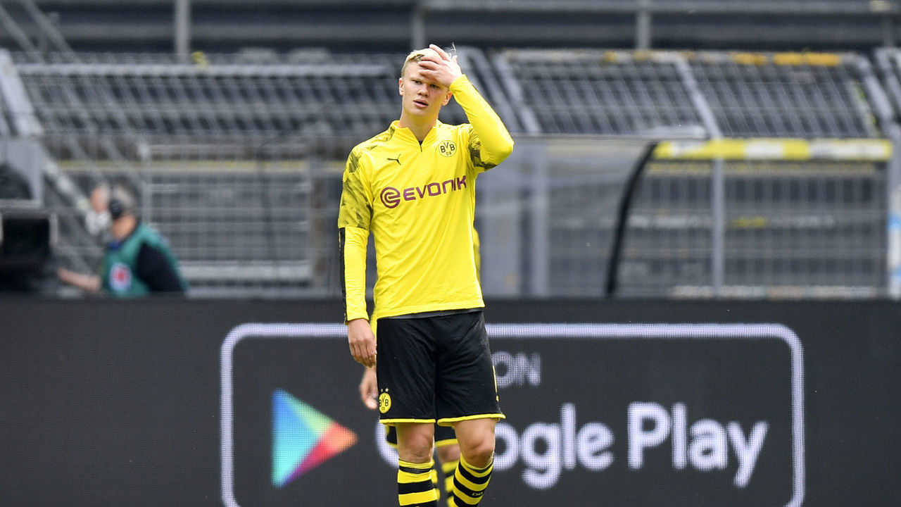 Dortmund's Norwegian forward Erling Braut Haaland stands on the pitch during warmup before the German first division Bundesliga football match BVB Borussia Dortmund v Schalke 04 on May 16, 2020 in Dortmund, western Germany as the season resumed following a two-month absence due to the novel coronavirus COVID-19 pandemic.