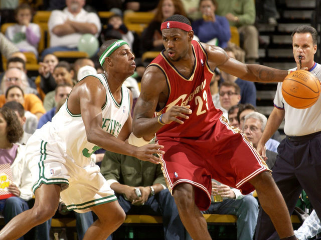 LeBron James (23), Of The Cleveland Drives Past Boston Celtics' Ricky Davis  During The Second Quarter At Cleveland's Gund Arena February 9, REUTERS/Ron  Kuntz RK/SV Stock Photo Alamy | Ricky Davis Lebron |