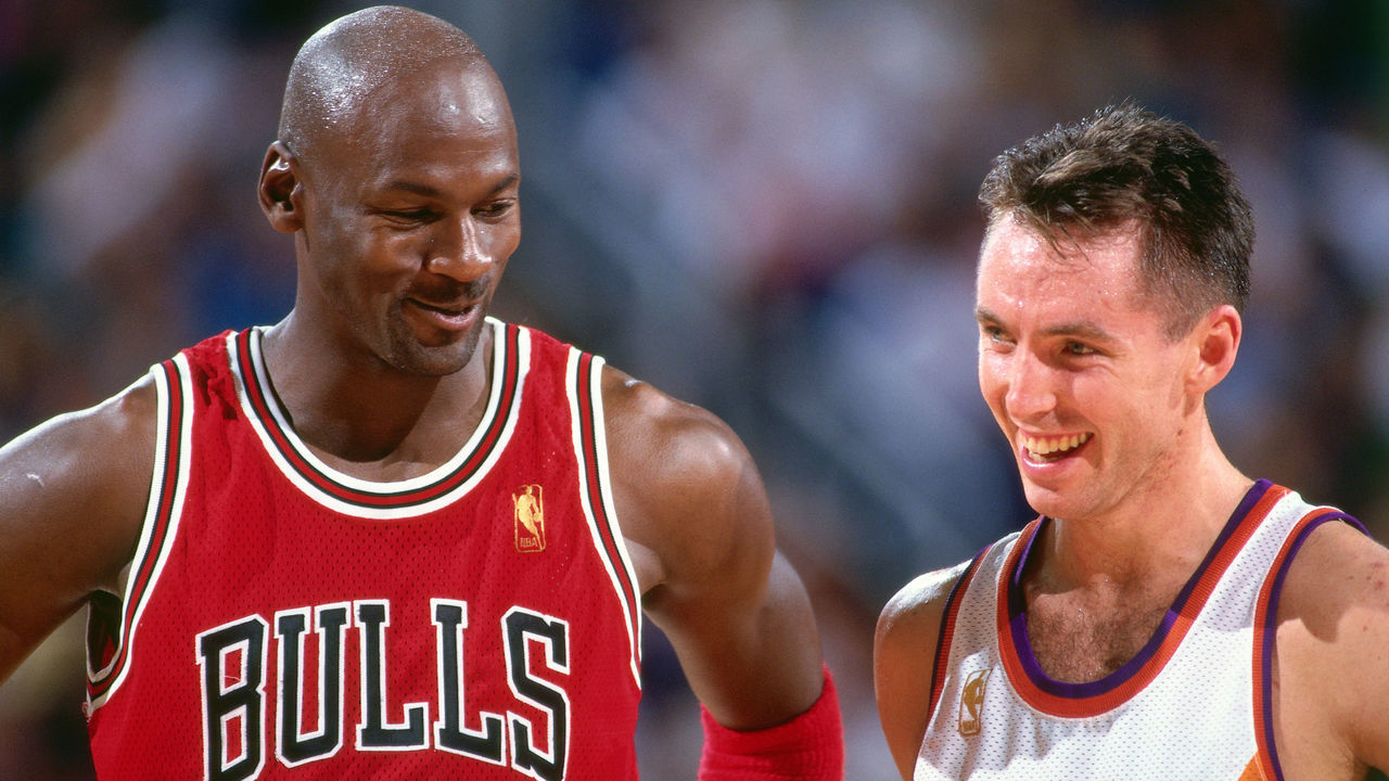 PHOENIX, AZ - NOVEMBER 20: Michael Jordan #23 of the Chicago Bulls is seen talking to Steve Nash #13 of Phoenix Suns during the game between the Chicago Bulls and the Phoenix Suns on November 20, 1996 at the America West Arena in Phoenix, Arizona. Mandatory Copyright Notice: Copyright 1996 NBAE