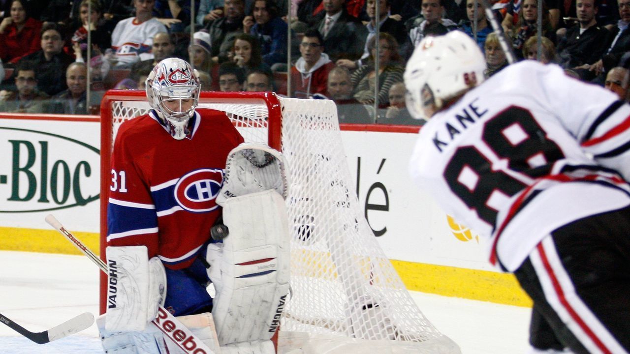 MONTREAL, CANADA - APRIL 5: Carey Price #31 of the Montreal Canadiens stops the puck on a shot by Patrick Kane #88 of the Chicago Blackhawks during the NHL game at the Bell Centre on April 5, 2011 in Montreal, Quebec, Canada. The Canadiens defeated the Blackhawks 2-1 in overtime.