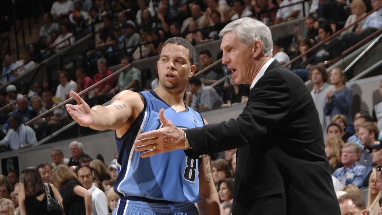 SAN ANTONIO - MAY 22: Deron Williams #8 and head coach Jerry Sloan of the Utah Jazz discuss strategy in Game Two of the Western Conference Finals against the San Antonio Spurs during the 2007 NBA Playoffs at the AT&T Center on May 22, 2007 in San Antonio, Texas. The Spurs won 105-96. Mandatory Copyright Notice: Copyright 2007 NBAE