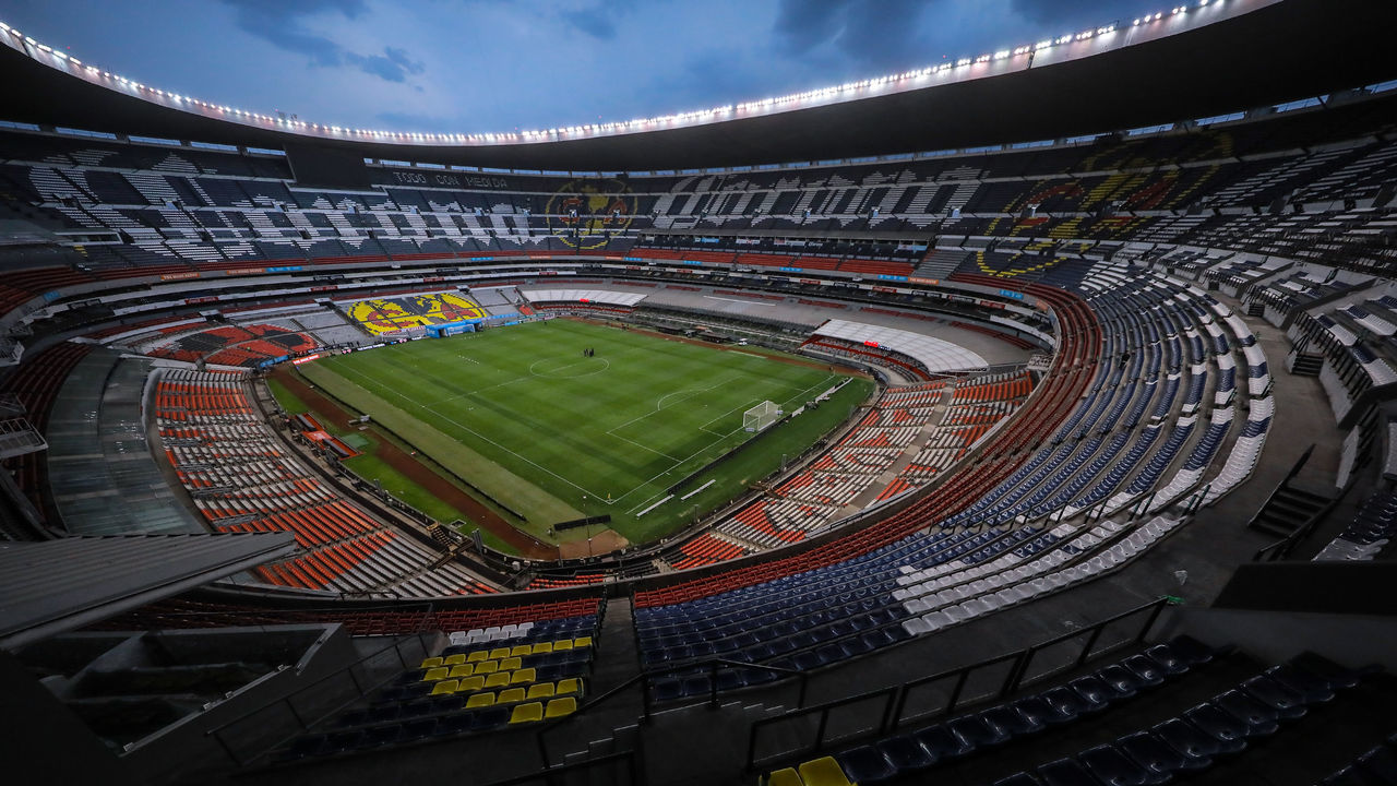 MEXICO CITY, MEXICO - MARCH 15: General view of an empty Azteca Stadium during the 10th round match between America and Cruz Azul as part of the Torneo Clausura 2020 Liga MX at Azteca Stadium on March 15, 2020 in Mexico City, Mexico. The match is played behind closed doors to prevent the spread of the novel Coronavirus (COVID-19).