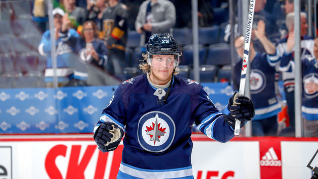 WINNIPEG, MB - MARCH 6: Patrik Laine #29 of the Winnipeg Jets salutes the fans after receiving second star honours following a 4-0 shutout victory over the Vegas Golden Knights at the Bell MTS Place on March 6, 2020 in Winnipeg, Manitoba, Canada.