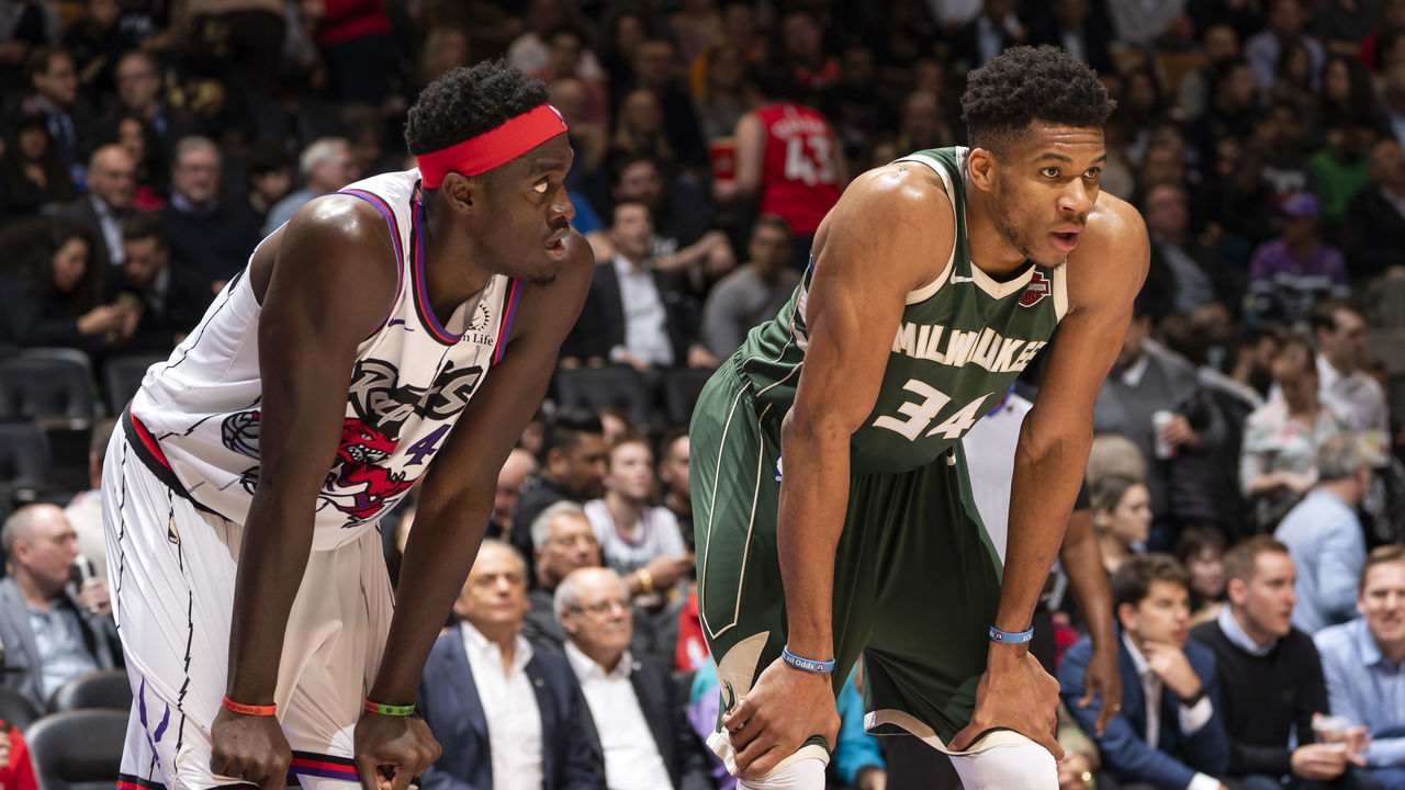 TORONTO, CANADA - FEBRUARY 25: Pascal Siakam #43 of the Toronto Raptors and Giannis Antetokounmpo #34 of the Milwaukee Bucks look on during the game on February 25, 2020 at the Scotiabank Arena in Toronto, Ontario, Canada. Mandatory Copyright Notice: Copyright 2020 NBAE