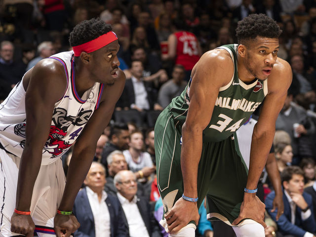 TORONTO, CANADA - FEBRUARY 25: Pascal Siakam #43 of the Toronto Raptors and Giannis Antetokounmpo #34 of the Milwaukee Bucks look on during the game on February 25, 2020 at the Scotiabank Arena in Toronto, Ontario, Canada. Mandatory Copyright Notice: Copyright 2020 NBAE