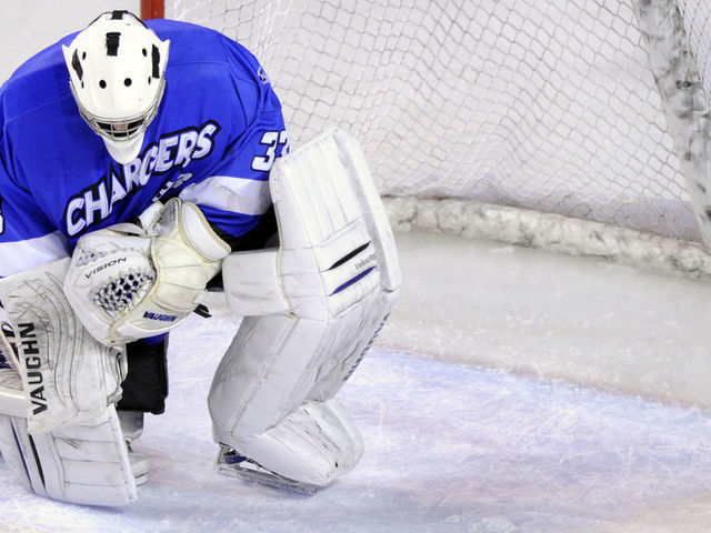 Chargers goalie Clarke Saunders (33) slumped in front of his net after allowing a puck bounce over his stick in the second period. The University of Denver hockey team hosted Alabama-Huntsville at Magness Arena Saturday night, January 7, 2012. Karl Gehring/The Denver Post