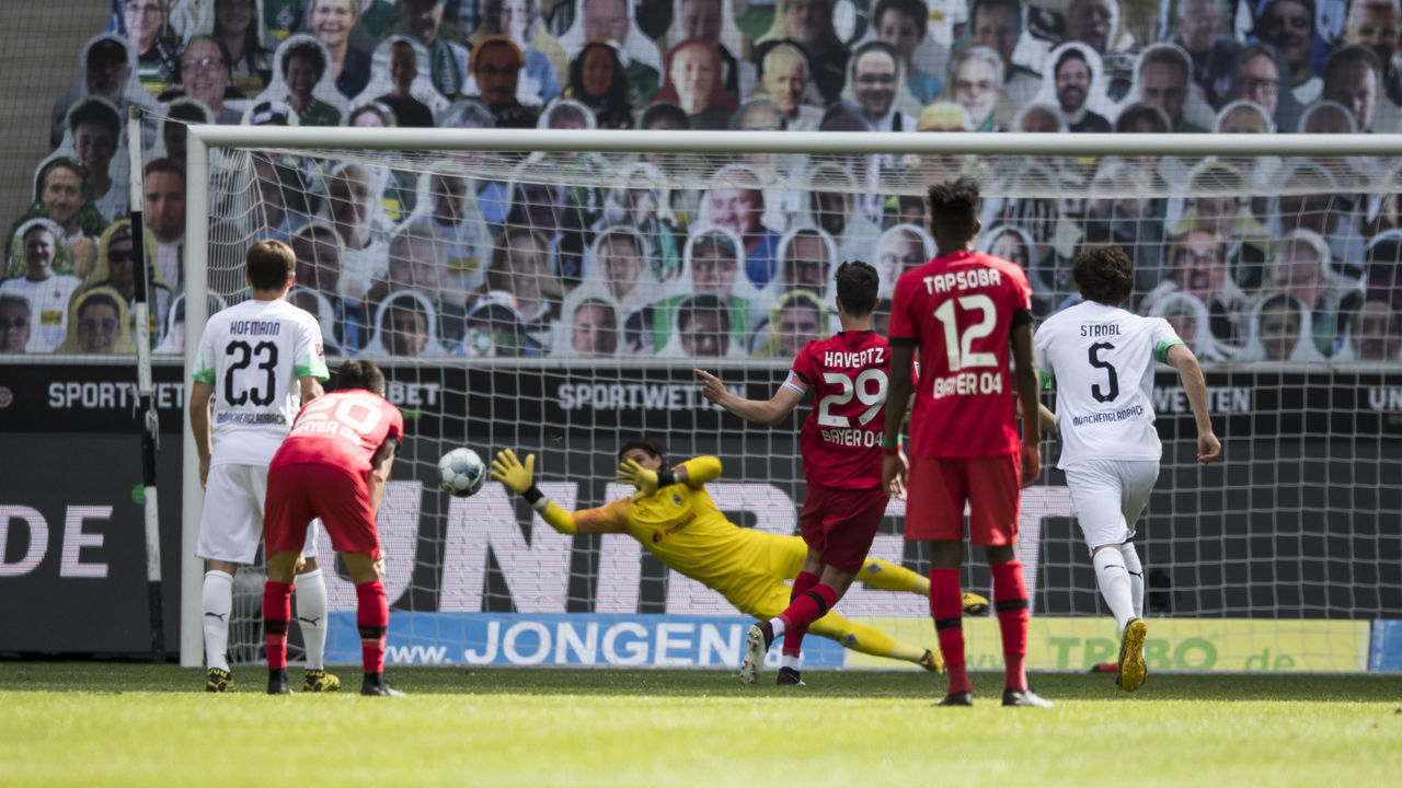 MOENCHENGLADBACH, GERMANY - MAY 23: Kai Havertz of Bayer 04 Leverkusen takes a penalty during the Bundesliga match between Borussia Moenchengladbach and Bayer 04 Leverkusen at Borussia-Park on May 23, 2020 in Moenchengladbach, Germany. The Bundesliga and Second Bundesliga is the first professional league to resume the season after the nationwide lockdown due to the ongoing Coronavirus (COVID-19) pandemic. All matches until the end of the season will be played behind closed doors