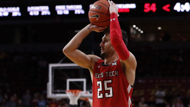 AMES, IA - FEBRUARY 22: Davide Moretti #25 of the Texas Tech Red Raiders takes a three point shot in the second half of the play at Hilton Coliseum on February 22, 2020 in Ames, Iowa. The Texas Tech Red Raiders won 87-57 over the Iowa State Cyclones.