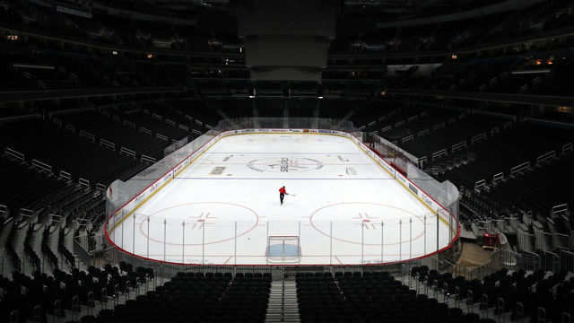 WASHINGTON, DC - MARCH 12: Sam Hess, Operations with Monumental Sports & Entertainment, skates alone prior Detroit Red Wings playing against the Washington Capitals at Capital One Arena on March 12, 2020 in Washington, DC. Today the NHL announced is has suspended their season due to the uncertainty of the coronavirus (COVID-19) with hopes of returning. The NHL currently joins the NBA, MLS, as well as, other sporting events and leagues around the world suspending play because of the coronavirus outbreak.