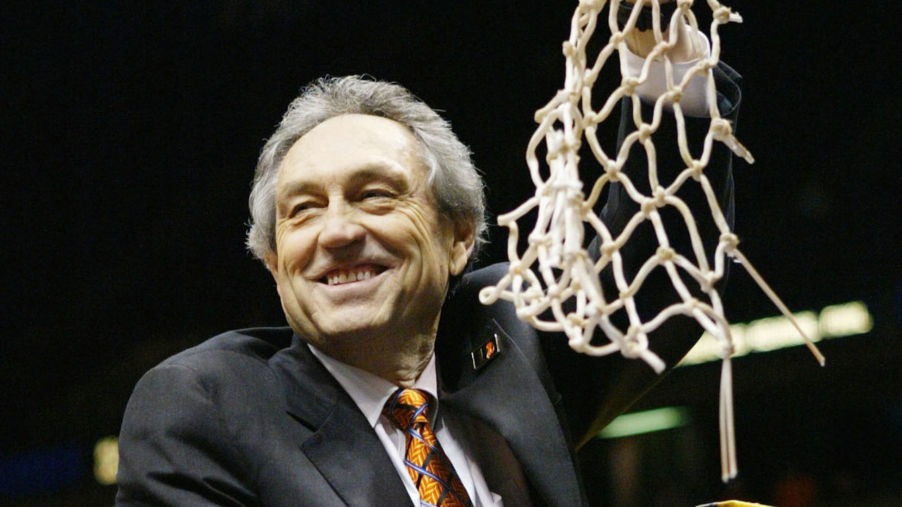 EAST RUTHERFORD, NJ - MARCH 27: Head coach Eddie Sutton of the Oklahoma State Cowboys celebrates by cutting down the net after defeating the St. Joseph's Hawks 64-62 during their fourth round regional game of the NCAA Division I Men's Basketball Tournament at Continental Airlines Arena on March 27, 2004 in East Rutherford, New Jersey.