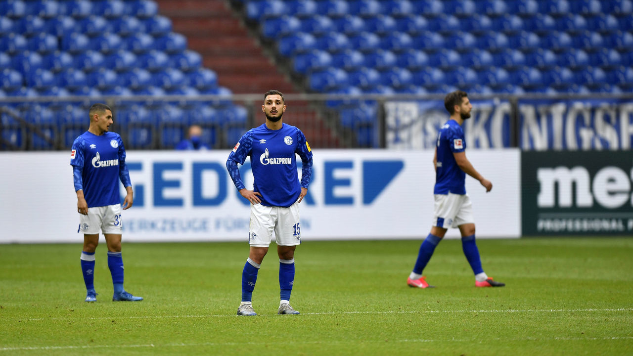 GELSENKIRCHEN, GERMANY - MAY 24: Ahmed Kutucu of FC Schalke 04 looks dejected after they conceded their second goal during the Bundesliga match between FC Schalke 04 and FC Augsburg at Veltins-Arena on May 24, 2020 in Gelsenkirchen, Germany.