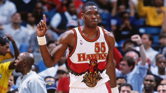ATLANTA, GA - APRIL 9: Dikembe Mutombo #55 of the Atlanta Hawks against the Indiana Pacers on April 9, 1998 at The Omni in Atlanta, Georgia. Mandatory Copyright Notice: Copyright 1998 NBAE