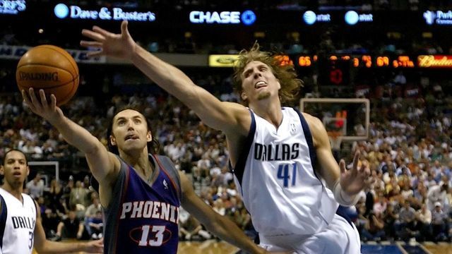 DALLAS - MAY 24: Steve Nash #13 of the Phoenix Suns lays the ball up past Dirk Nowitzki #41 of the Dallas Mavericks in game one of the Western Conference Finals during the 2006 NBA Playoffs on May 24, 2006 at American Airlines Center in Dallas, Texas.