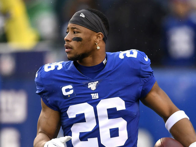 EAST RUTHERFORD, NEW JERSEY - DECEMBER 29: Saquon Barkley #26 of the New York Giants warms up prior to the game against the Philadelphia Eagles at MetLife Stadium on December 29, 2019 in East Rutherford, New Jersey.
