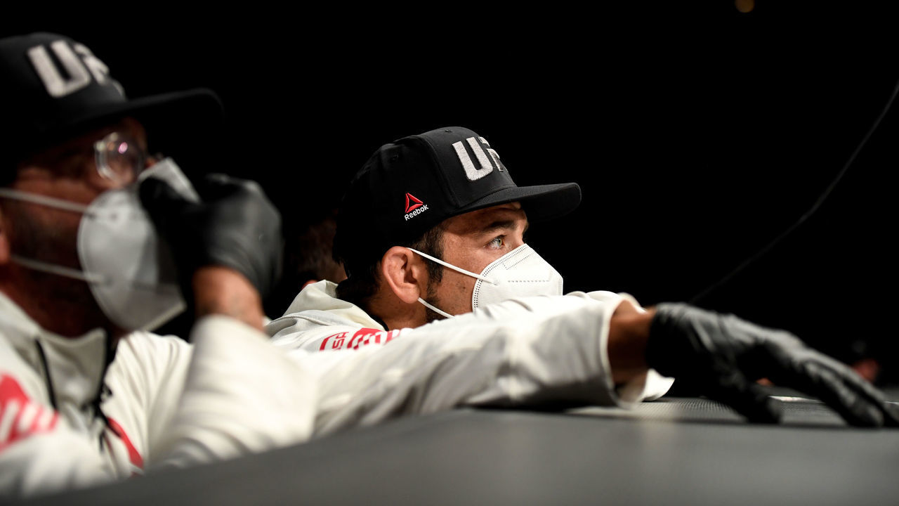 JACKSONVILLE, FL - MAY 09: Team members wear protective face masks during the Welterweight fight between Niko Price (not pictured) of the United States and Vicente Luque (not pictured) of the United States during UFC 249 at VyStar Veterans Memorial Arena on May 9, 2020 in Jacksonville, Florida.
