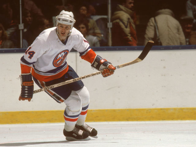Canadian hockey player Bob Bourne of the New York Islanders skates while he keeps an eye on the action during a home game at Nassau Coliseum, Uniondale, New York, February 1984.