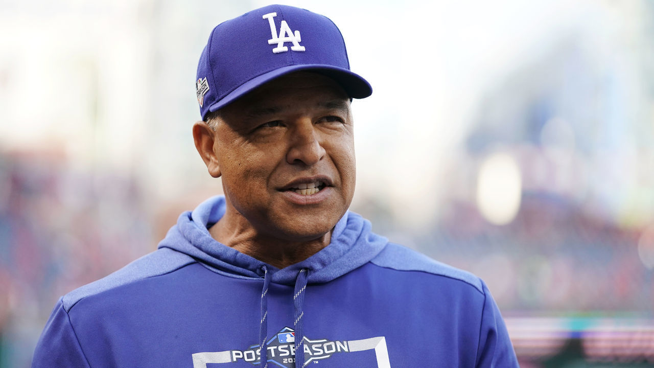 WASHINGTON, DC - OCTOBER 07: Manager Dave Roberts #30 of the Los Angeles Dodgers looks on during batting practice before Game Four of the National League Divisional Series against the Washington Nationals at Nationals Park on October 7, 2019 in Washington, DC.