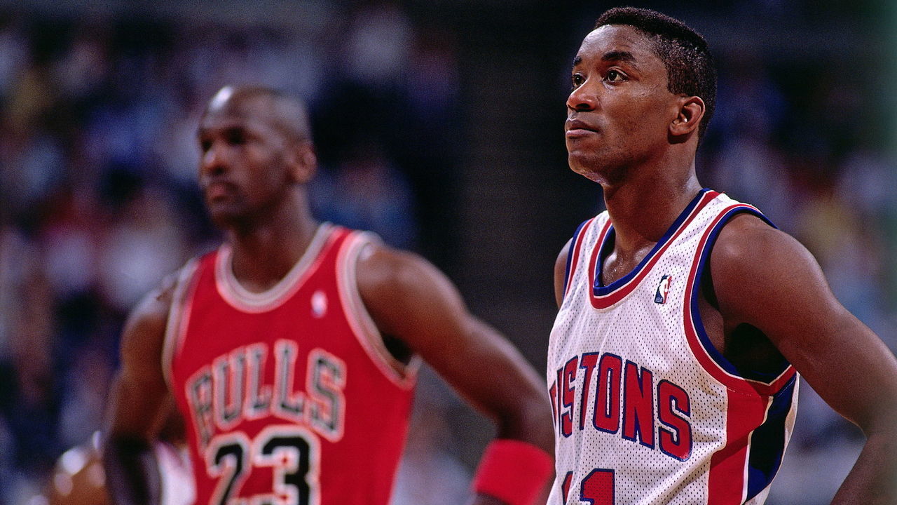 AUBURN HILLS, MI - 1989: Isiah Thomas #11 of the Detroit Pistons takes some time to catch his breath with Michael Jordan #23 of the Chicago Bulls during a break in the action during an NBA game at The Palace circa 1989 in Auburn Hills, Michigan. NOTE TO USER: User expressly acknowledges and agrees that, by downloading and/or using this Photograph, user is consenting to the terms and conditions of the Getty Images License Agreement. Mandatory Copyright Notice: Copyright 1989 NBAE