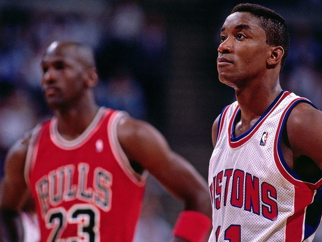 AUBURN HILLS, MI - 1989: Isiah Thomas #11 of the Detroit Pistons takes some time to catch his breath with Michael Jordan #23 of the Chicago Bulls during a break in the action during an NBA game at The Palace circa 1989 in Auburn Hills, Michigan. NOTE TO USER: User expressly acknowledges and agrees that, by downloading and/or using this Photograph, user is consenting to the terms and conditions of the Getty Images License Agreement. Mandatory Copyright Notice: Copyright 1989 NBAE