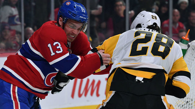 MONTREAL, QC - JANUARY 4: Max Domi #13 of the Montreal Canadiens fightss. with Marcus Pettersson #28 of the Pittsburgh Penguins in the NHL game at the Bell Centre on January 4, 2020 in Montreal, Quebec, Canada.