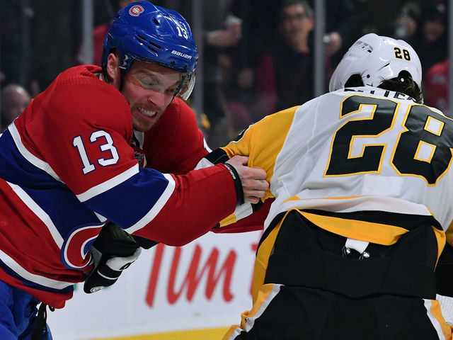 MONTREAL, QC - JANUARY 4: Max Domi #13 of the Montreal Canadiens fightss. with Marcus Pettersson #28 of the Pittsburgh Penguins in the NHL game at the Bell Centre on January 4, 2020 in Montreal, Quebec, Canada.