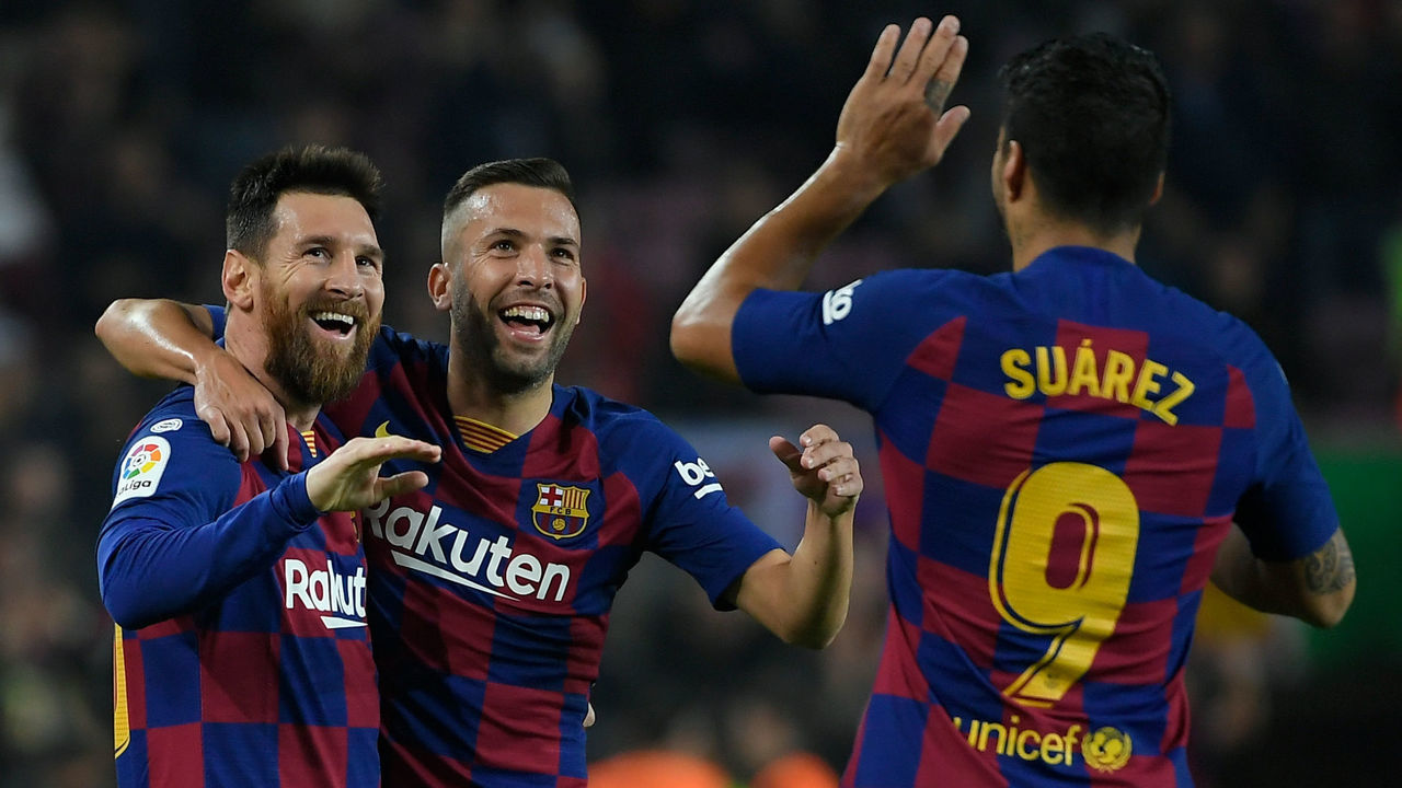 Barcelona's Argentine forward Lionel Messi (L) celebrates his goal with Barcelona's Spanish defender Jordi Alba and Barcelona's Uruguayan forward Luis Suarez during the Spanish league football match between FC Barcelona and Real Valladolid FC at the Camp Nou stadium in Barcelona on October 29, 2019.