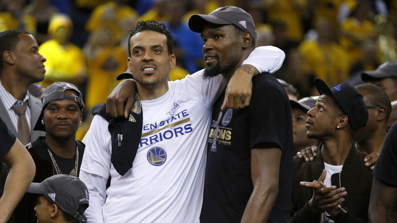 Golden State Warriors' Matt Barnes (22) talks with Golden State Warriors' Kevin Durant (35) after Durant received the MVP for the Finals after the Warriors 129-120 win against the Cleveland Cavaliers for Game 5 of the NBA Finals at Oracle Arena in Oakland, Calif., on Monday, June 12, 2017. (Nhat V. Meyer/Bay Area News Group)