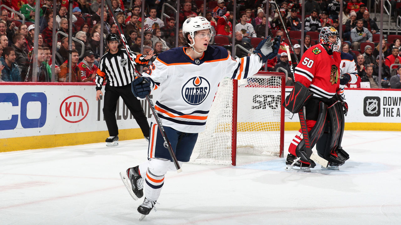 CHICAGO, IL - MARCH 05: Kailer Yamamoto #56 of the Edmonton Oilers reacts after scoring against the Chicago Blackhawks in the third period at the United Center on March 5, 2020 in Chicago, Illinois.