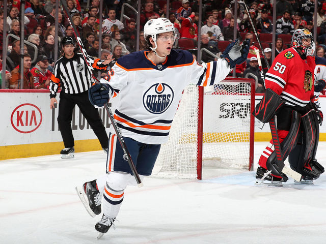 CHICAGO, IL - MARCH 05: Kailer Yamamoto #56 of the Edmonton Oilers reacts after scoring against the Chicago Blackhawks in the third period at the United Center on March 5, 2020 in Chicago, Illinois.