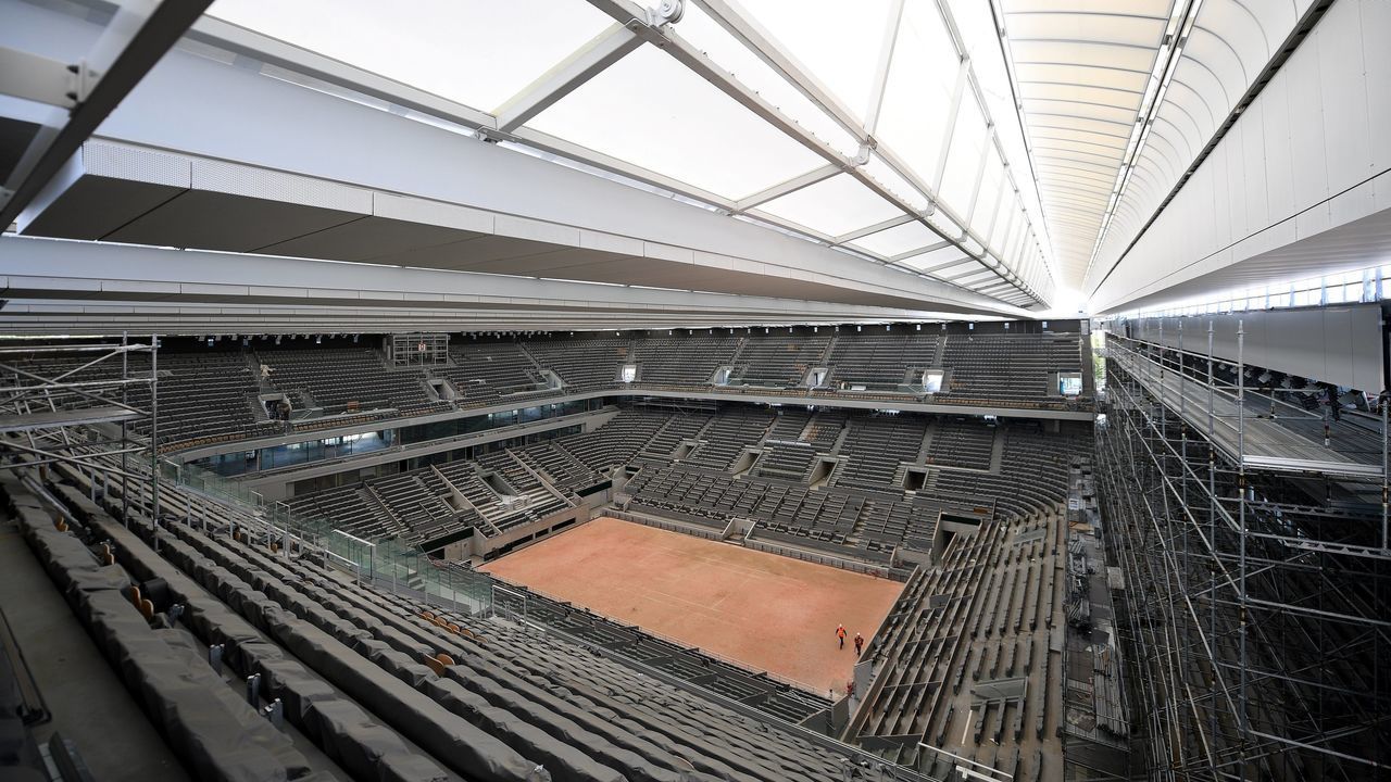 A photograph taken on May 27, 2020 shows the newly built roof and the Philippe Chatrier central tennis court at the Roland Garros stadium, in Paris. - The Roland Garros 2020 French Open tennis tournament should have started on May 24, 2020, instead, it will be held between September 20 and October 4, 2020 due to the COVID-19 pandemic.