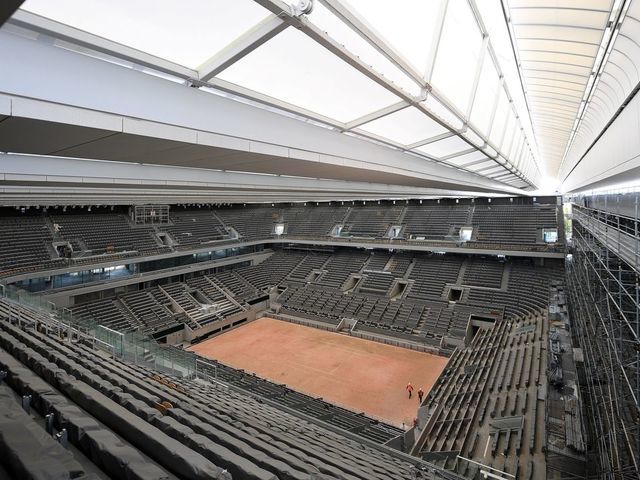 A photograph taken on May 27, 2020 shows the newly built roof and the Philippe Chatrier central tennis court at the Roland Garros stadium, in Paris. - The Roland Garros 2020 French Open tennis tournament should have started on May 24, 2020, instead, it will be held between September 20 and October 4, 2020 due to the COVID-19 pandemic.