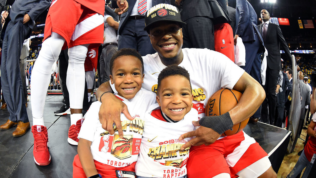 OAKLAND, CA - JUNE 13: Kyle Lowry #7 of the Toronto Raptors poses for a photo with his children after Game Six of the NBA Finals against the Golden State Warriors on June 13, 2019 at ORACLE Arena in Oakland, California. NOTE TO USER: User expressly acknowledges and agrees that, by downloading and/or using this photograph, user is consenting to the terms and conditions of Getty Images License Agreement. Mandatory Copyright Notice: Copyright 2019 NBAE