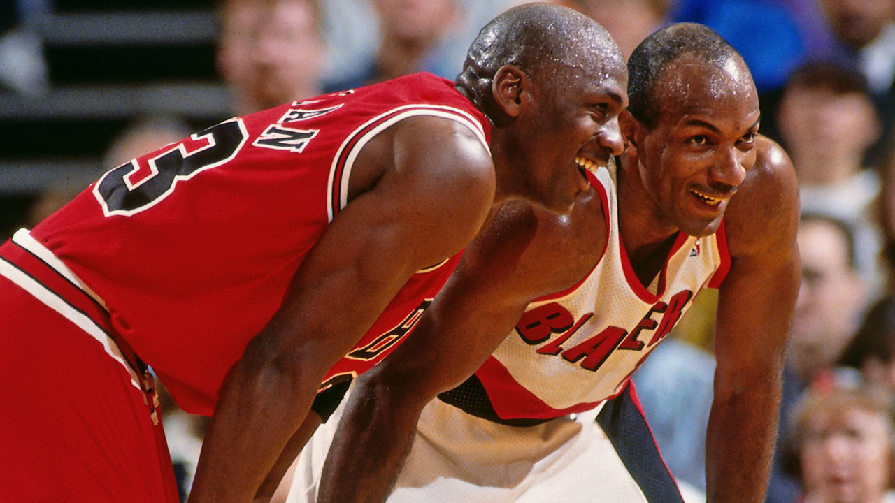 PORTLAND, OR - FEBRUARY 7: Michael Jordan #23 of the Chicago Bulls and Clyde Drexler #22 of the Portland Trail Blazers look on during the game between the two teams on February 7, 1993 at Memorial Coliseum in Portland, Oregon. Mandatory Copyright Notice: Copyright 1993 NBAE