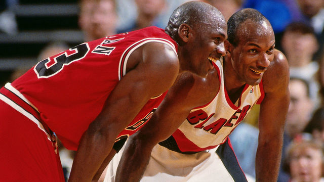 PORTLAND, OR - FEBRUARY 7: Michael Jordan #23 of the Chicago Bulls and Clyde Drexler #22 of the Portland Trail Blazers look on during the game between the two teams on February 7, 1993 at Memorial Coliseum in Portland, Oregon. Mandatory Copyright Notice: Copyright 1993 NBAE