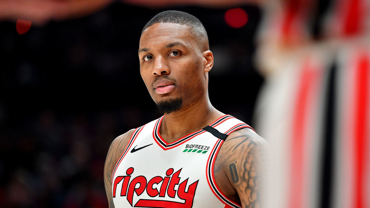 PORTLAND, OREGON - MARCH 04: Damian Lillard #0 of the Portland Trail Blazers looks on during the second half of the game against the Washington Wizards at the Moda Center on March 04, 2020 in Portland, Oregon. The Portland Trail Blazers topped the Washington Wizards, 125-105.