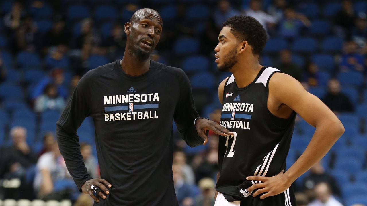 MINNEAPOLIS, MN - OCTOBER 5: Kevin Garnett #21 and Karl-Anthony Towns #32 of the Minnesota Timberwolves talk during a scrimmage on October 5, 2015 at Target Center in Minneapolis, Minnesota. Mandatory Copyright Notice: Copyright 2015 NBAE