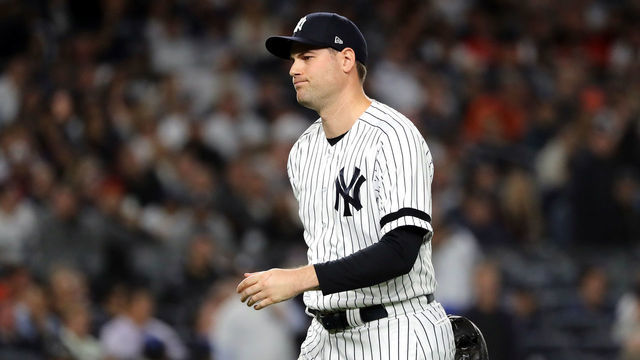 NEW YORK, NEW YORK - OCTOBER 15: Adam Ottavino #0 of the New York Yankees reacts as he walks to the dugout after being pulled during the seventh inning against the Houston Astros in game three of the American League Championship Series at Yankee Stadium on October 15, 2019 in New York City.