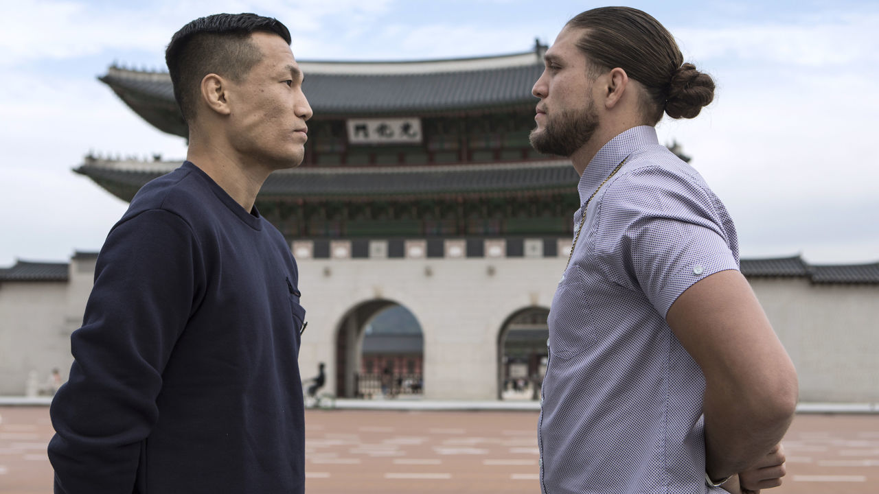 SEOUL, SOUTH KOREA - OCTOBER 17: Brian Ortega(right) and Chan Sung Jung also known as Korean Zombie face off in front of Gwanghwamun in Seoul, South Korea on October 17, 2019 ahead of the mixed martial arts event produced by the Ultimate Fighting Championship that is planned to take place in December in Busan, Korea.