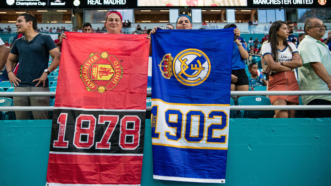 MIAMI, FL - JULY 31: Fans hold banners before the International Champions Cup match between Manchester United and Real Madrid at Hard Rock Stadium on July 31, 2018 in Miami, Florida.
