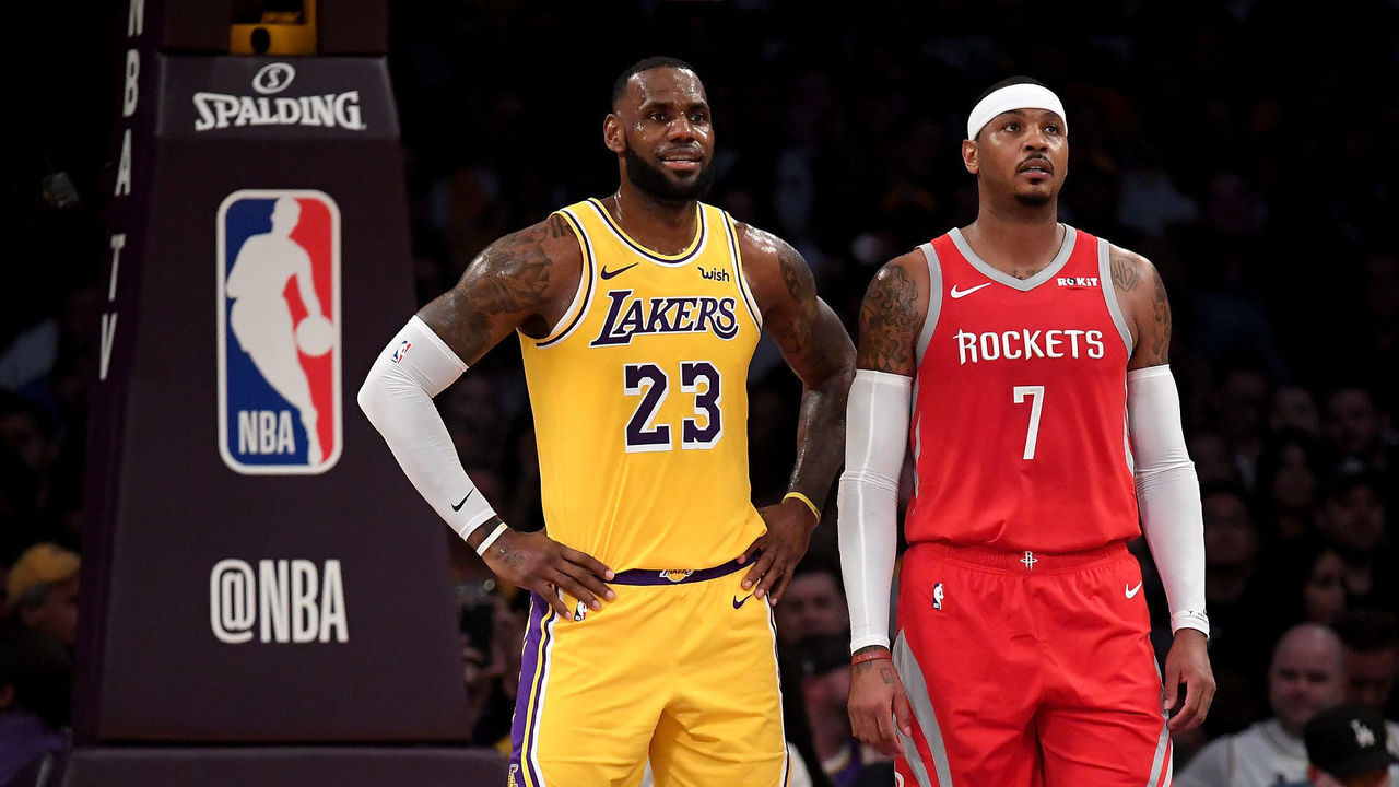 LOS ANGELES, CA - OCTOBER 20: LeBron James #23 of the Los Angeles Lakers and Carmelo Anthony #7 of the Houston Rockets wait for and inbound at Staples Center on October 20, 2018 in Los Angeles, California.