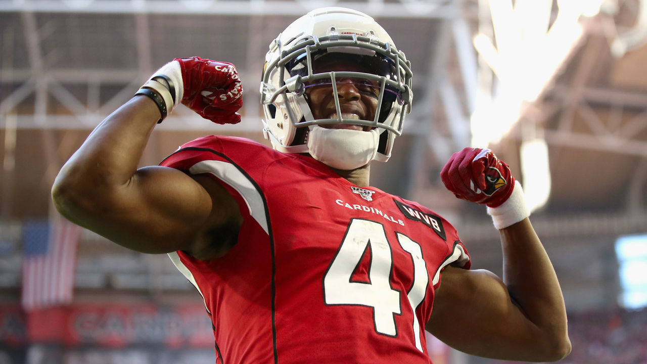 GLENDALE, ARIZONA - DECEMBER 15: Running back Kenyan Drake #41 of the Arizona Cardinals celebrates after scoring on a five yard rushing touchdown against the Cleveland Browns during the first half of the NFL game at State Farm Stadium on December 15, 2019 in Glendale, Arizona.