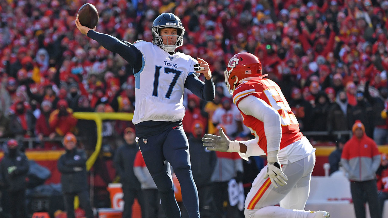 KANSAS CITY, MO - JANUARY 19: Quarterback Ryan Tannehill #17 of the Tennessee Titans throws a pass in the first half against pressure from defensive end Frank Clark #55 of the Kansas City Chiefs, in the AFC Championship Game at Arrowhead Stadium on January 19, 2020 in Kansas City, Missouri.