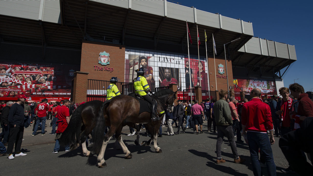 LIVERPOOL, ENGLAND - MAY 12: Police on horseback patrol outside The Kop end at Anfield before the Premier League match between Liverpool FC and Wolverhampton Wanderers at Anfield on May 12, 2019 in Liverpool, United Kingdom.