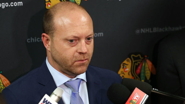 CHICAGO, IL - JANUARY 10: Stan Bowman, Chicago Blackhawks senior vice president and general manager, speaks to the media in between periods of the game between the Chicago Blackhawks and the Minnesota Wild at the United Center on January 10, 2018 in Chicago, Illinois.