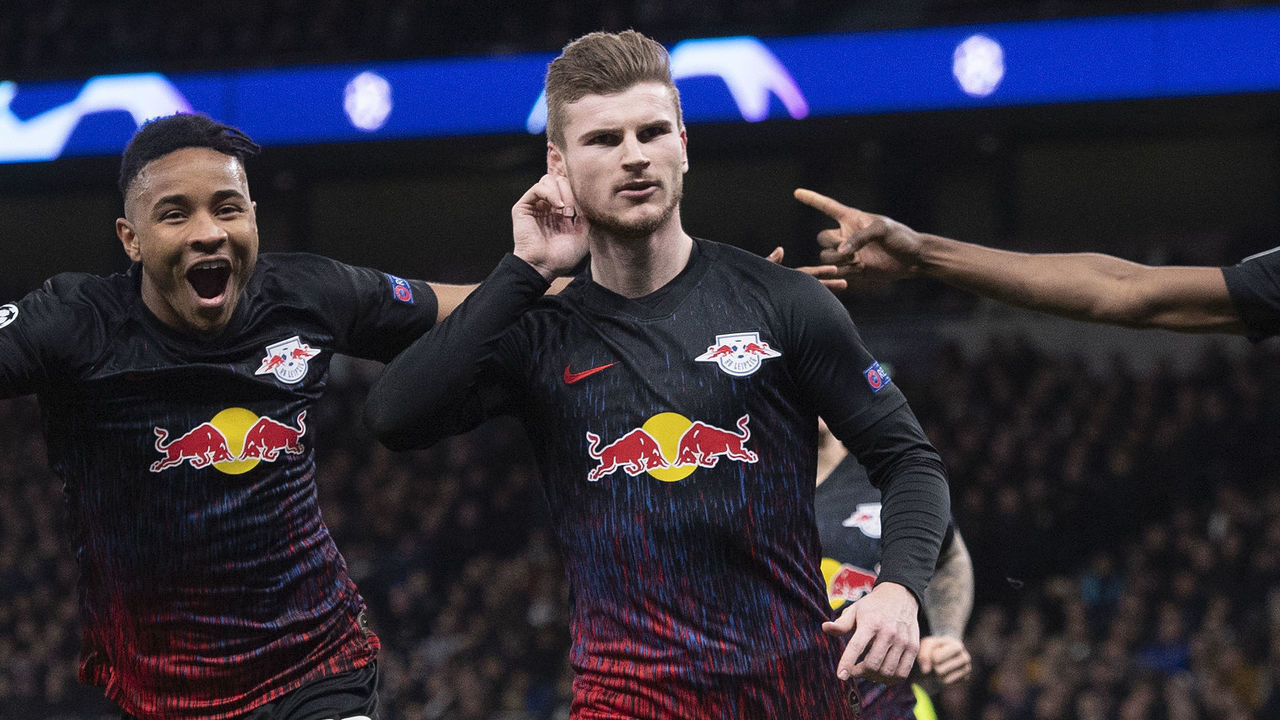 LONDON, ENGLAND - FEBRUARY 19: Timo Werner of RB Leipzig (centre) celebrates scoring the winning goal with Christopher Nkunku (left) and Nordi Mukiele during the UEFA Champions League round of 16 first leg match between Tottenham Hotspur and RB Leipzig at Tottenham Hotspur Stadium on February 19, 2020 in London, United Kingdom.