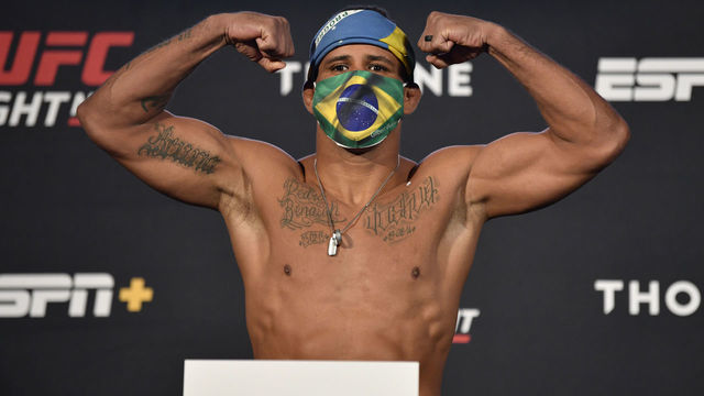 LAS VEGAS, NEVADA - MAY 29: Gilbert Burns of Brazil poses on the scale during the UFC weigh-in at UFC APEX on May 29, 2020 in Las Vegas, Nevada.