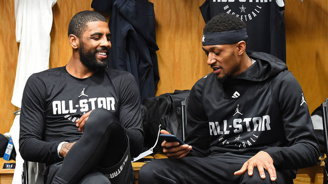 CHARLOTTE, NC - FEBRUARY 16: Kyrie Irving #11 and Bradley Beal #3 of Team LeBron talk in the locker room before the 2019 NBA All-Star Practice and Media Availability on February 16, 2019 at Bojangles Coliseum in Charlotte, North Carolina. Mandatory Copyright Notice: Copyright 2019 NBAE