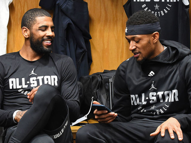 CHARLOTTE, NC - FEBRUARY 16: Kyrie Irving #11 and Bradley Beal #3 of Team LeBron talk in the locker room before the 2019 NBA All-Star Practice and Media Availability on February 16, 2019 at Bojangles Coliseum in Charlotte, North Carolina. Mandatory Copyright Notice: Copyright 2019 NBAE